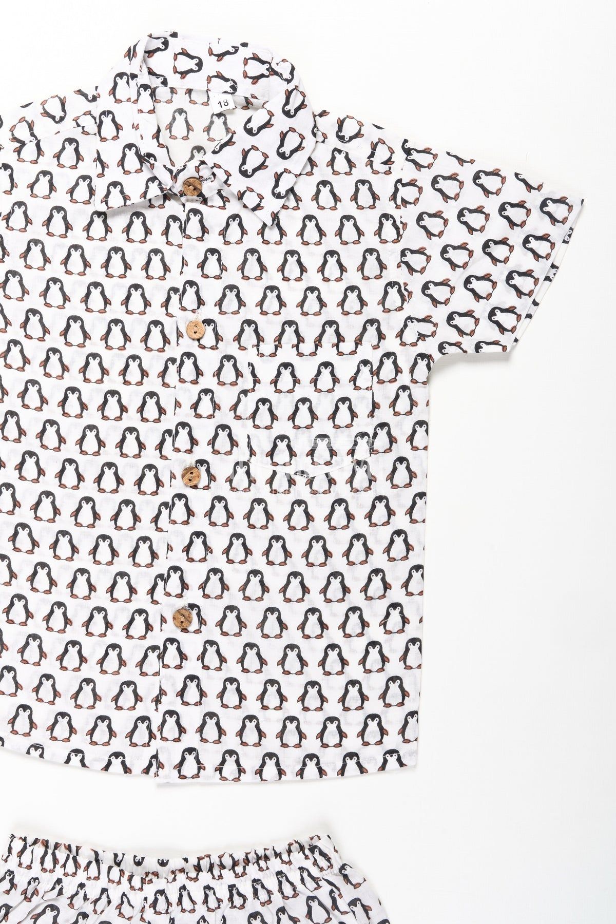 1762415561875-nesavu-boys-smart-and-casual-wear-set-with-penguin-print-shirt-and-matching-shorts-in-cool-cotton-fabric-boys-casual-set-thenesavu-nesavu-boys-smart-casual-wear-cotton-set-all-over-penguin-print-shirt-shorts-1174712740_1800x1800.jpg